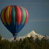 Hot air balloon from Bend balloon rally with Mt Jefferson in background